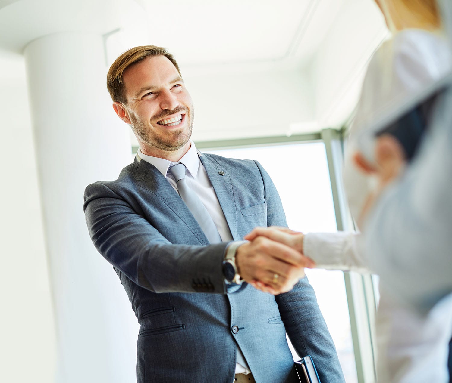 Portrait,Of,A,Young,Beautiful,Businesspeople,Shaking,Hands,Introducing,Each